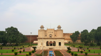 Exterior View of Lahore Fort (Shahi Qilla) with small garden in foreground. Lahore Fort is located opposite to Badshahi Mosque in Lahore and is one of the most visited tourist destination. - Image