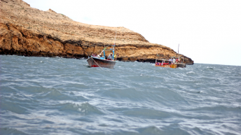 Beautiful view of sea and boat with pleasant atmosphere at charna island karachi Pakistan